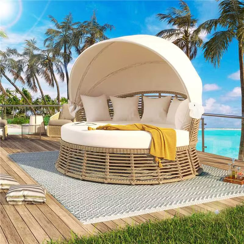 Élanor beige round wicker patio daybed with retractable canopy