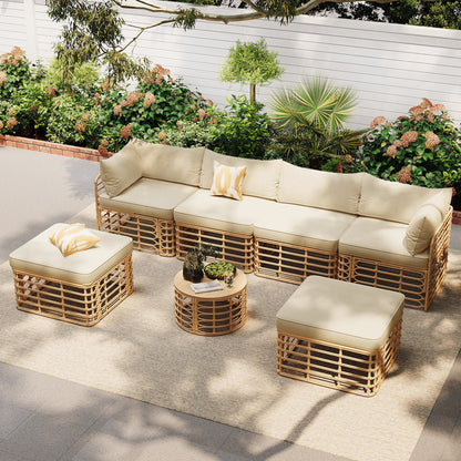 Ondine outdoor sectional arranged in a U-shape around the round table
